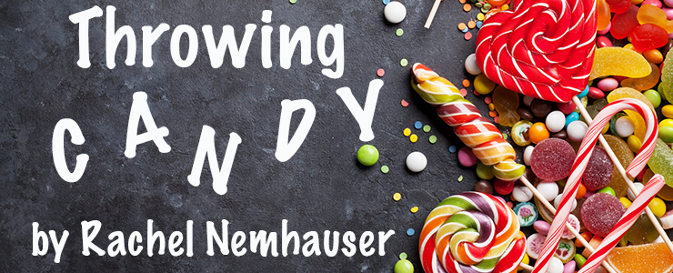 Colorful candies, jelly and marmalade over stone background. Top view with title: Throwing Candy by Rachel Nemhauser