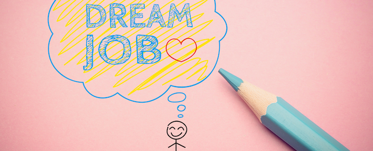 stick figure drawing on the paper, with thought bubble that says "Dream Job", blue pencil aside.