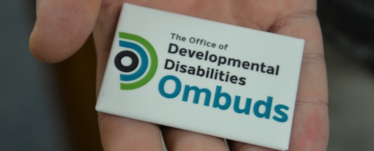 hand holding an Office of Developmental Disabilities Ombuds magnet