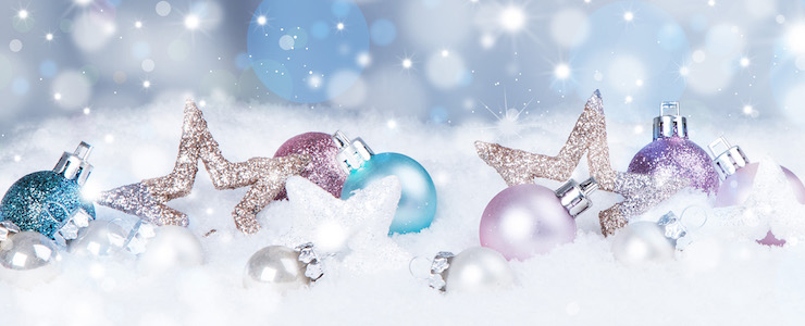 Christmas background with blue baubles,snow and snowflakes, free space for text. Christmas decoration.