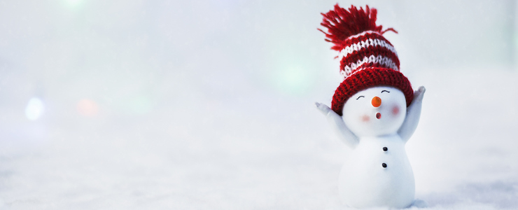 Happy snowman in red knit hat, snowy landscape.