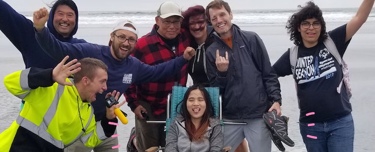 Camp without Borders 2021 Launch announcement. Young adults at the beach, celebrating.